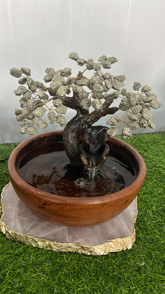 Fonte com árvore pirita