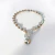 PULSERA CRISTALES 4MM CON BOLITAS DE PLATA Y DIJE (490) en internet