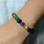 Pulseira de Pedra Ônix com 7 chakras na internet