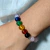 Pulseira de Pedra Quartzo Rosa com 7 chakras na internet