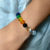 Pulseira de Pedra Cristal com 7 chakras na internet
