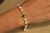 Pulseira Pérolas com Espírito Santo - comprar online