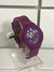 Reloj Reebok de dama con malla de silicona violeta o negra.