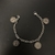 Pulsera de acero con dijes de San Benito - comprar online