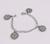 Pulsera de acero con dijes de San Benito - comprar online