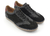 Zapatilla de cuero color negro