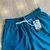 Bermuda Nike Refletiva Esmeralda na internet