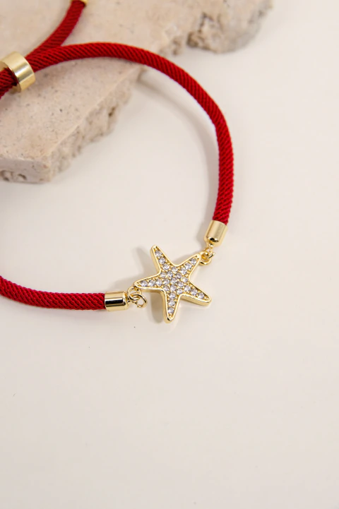 PULSERA CORDÓN ROJO ESTRELLA STRAS DORADO