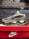 NIKE SCORPION PLATEADA