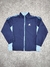 Campera rompeviento Champion mujer SKU J10 *