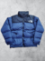 Campera The North Face Estampada Nuptse 700 Azul SKU J204 *