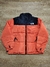 Campera The North Face Bordada Nuptse Naranja SKU J86 * - comprar online
