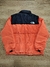 Campera The North Face Bordada Nuptse Naranja SKU J86 * - tienda online