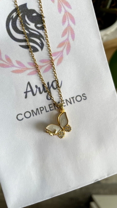 Cadenita anti estrés giratoria- mariposa nacar dorada en internet