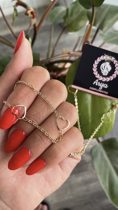 Cadena con corazones - acero dorado