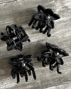 Broche negro flor en internet