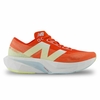 TENIS NEW BALANCE FUELCELL REBEL V4 FEMININO LARANJA