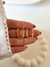 Imagen de Argollas Ivory click acero dorado (par)