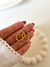 Argollas Ivory click acero dorado (par) - Alaris Accesorios
