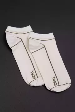 Media New Line / Tucci