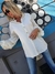 Imagen de MAXI CAMISA DETALLE BOTONES Y MANGAS 67333
