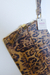 Clutch Animal Print na internet