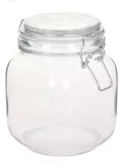 Frasco de vidrio transparente con cierre hermético de 9x9x17 cm, ideal para almacenar alimentos o especias.