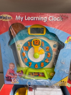 WIN FUN RELOJ EDUCATIVO CASITA MUSICAL