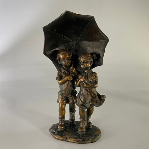 escultura-de-menino-e-menina