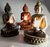 buda para decoração com porta velas