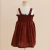 Vestido infantil marrom chocolate com alças largas e detalhe franzido no busto, estilo linho