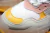 BALENCIAGA TRIPLE S SNEAKER WHITE/YELLOW - DAIKAN