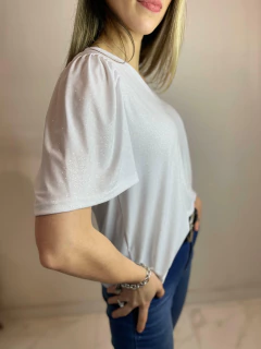 Imagen de BLUSA CON BRILLOS ESCOTE EN V