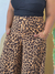 Calça Maxi Pantalona Estampa Onça na internet