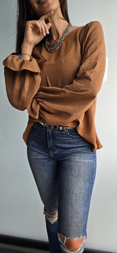 Blusa de cey m/l con frunce en puños en internet