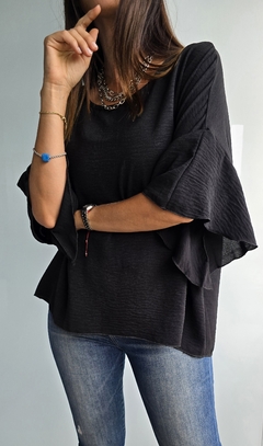 Blusa amplia de cey mangas volado 3/4 con gota atras en internet
