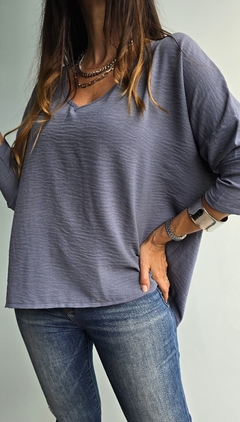 Blusa amplia de cey mangas 3/4 comun con gota atras en internet