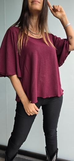 Blusa de cey mangas volado 3/4 con gota atras en internet