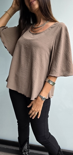 Blusa de cey mangas volado 3/4 con gota atras en internet