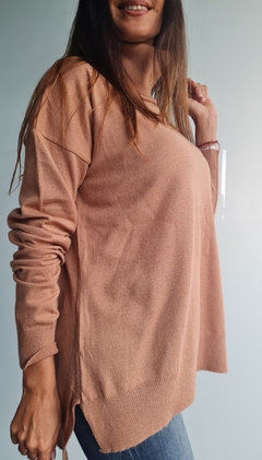 Imagen de Polera de bremer con tajos laterales y mas larga atrás