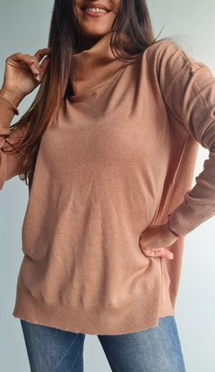 Imagen de Polera de bremer con tajos laterales y mas larga atrás