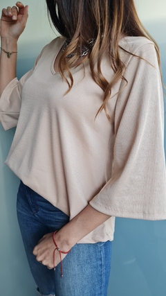 Imagen de Remera manga 3/4 en morley satinado con tira atrás