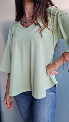 Remera manga 3/4 en morley satinado con tira atrás en internet