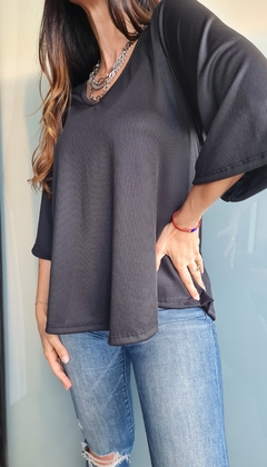 Imagen de Remera manga 3/4 en morley satinado con tira atrás