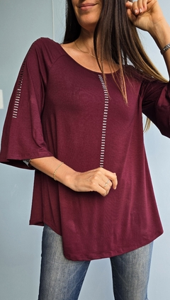 Remera de modal con tachas evase mangas 3/4 en internet