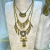 Collar metal triple flechas