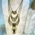 Collar metal triple flechas en internet