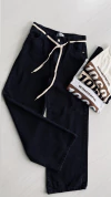 Jeans wide leg black tiro bajo con cordon 20% off transferencia
