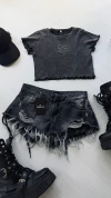 Short gris tiro bajo roturas blancas 20 % off transferencia - comprar online