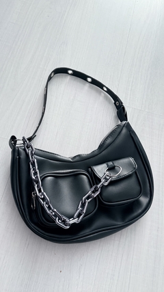 bag con cadena y bolsillos 20%off transferencia